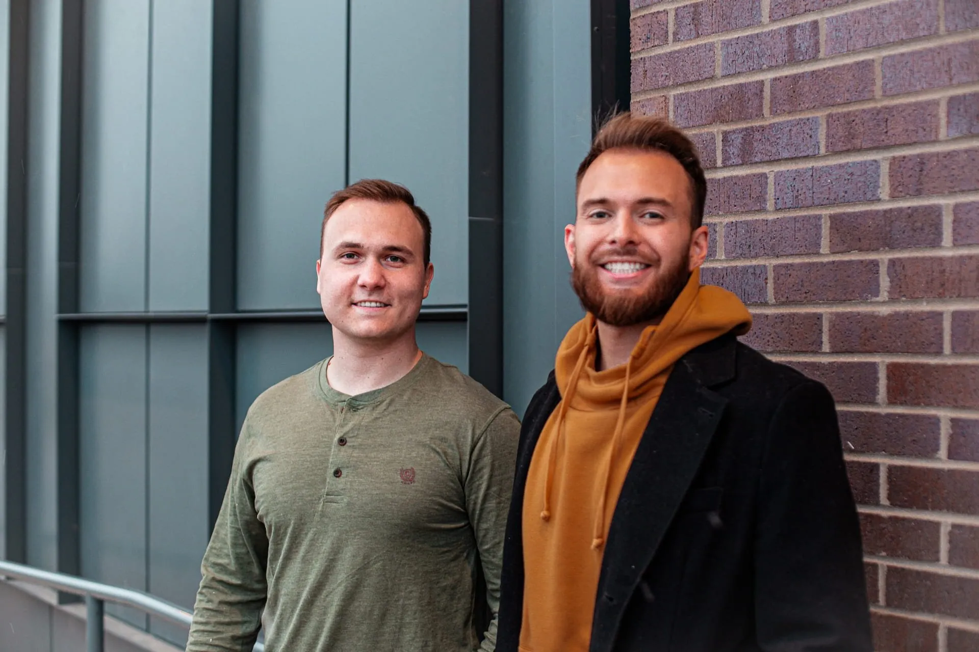 business owners parker and austin standing next to eachother